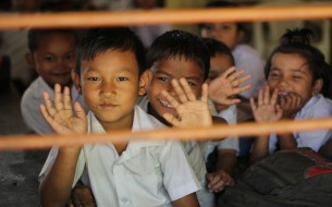 Smiling faces of mid day meal beneficiary in assam